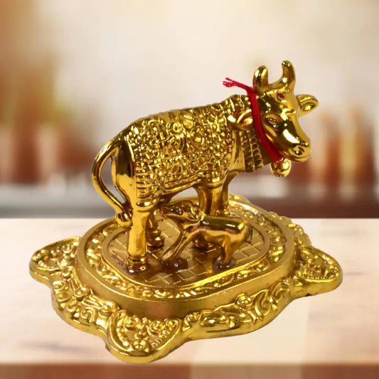 Metal golden kamdhenu cow with calf showpiece essential idol|idols - USB Powered