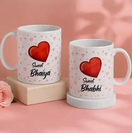 Rakhi Gift Combo Set – Bhaiya Bhabhi Rakhi with 2 Coffee Mugs & Festive Gift Set (5 Pieces)