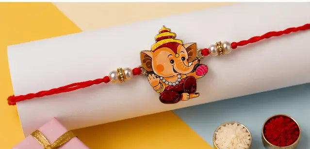Friendly Wooden Ganpati Bappa Cartoon Rakhi for Kids | Handmade Rakshabandhan Rakhi with Roli Chawal
