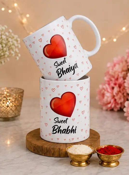 Rakhi Gift Combo Set – Bhaiya Bhabhi Rakhi with 2 Coffee Mugs & Festive Gift Set (5 Pieces)